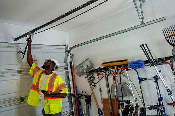 Professional Garage Door Panel Replacement technician working in El Reno, OK